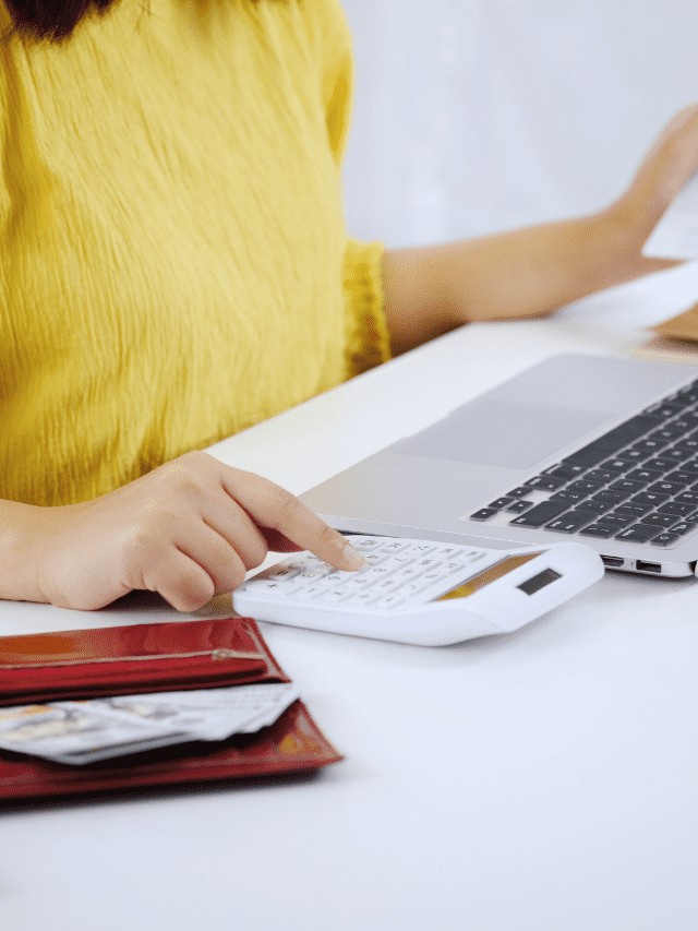 Woman Calculating Budget Stock
