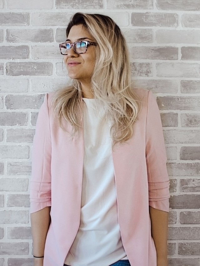Woman In Pink Cardigan Stock