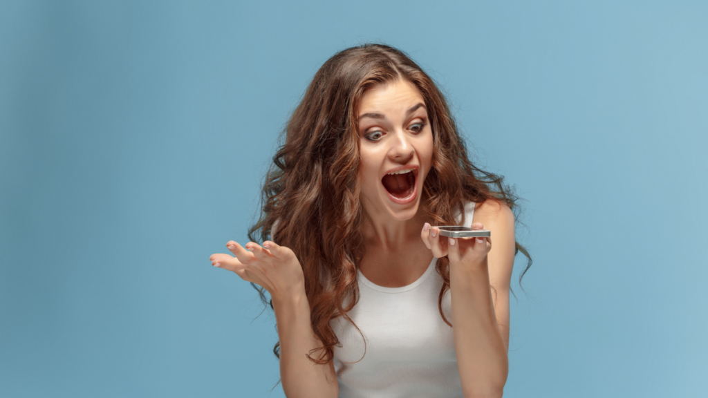 Woman Screaming At Phone Shocked MSN