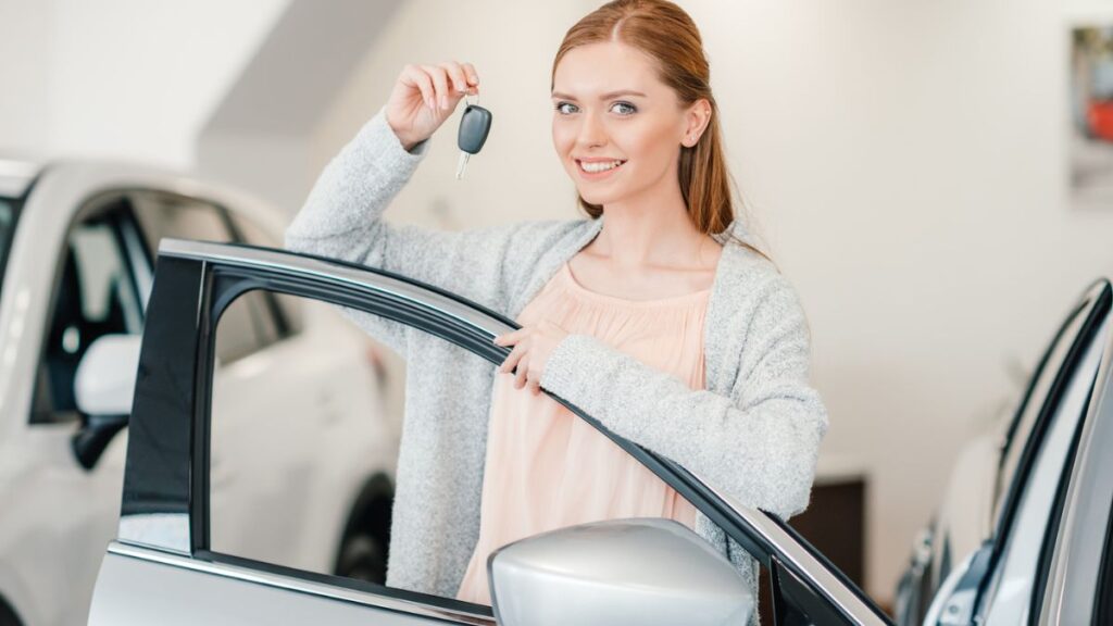 Woman Holding A Car Key