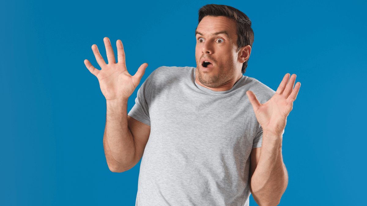 Man Looking Scared and Shocked, Hands Up MSN