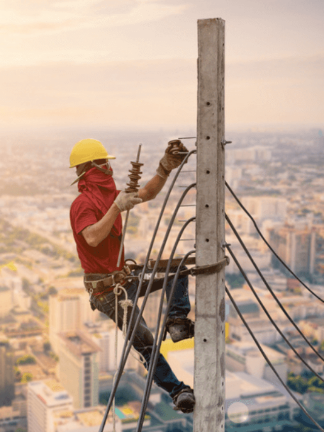Electrician are climbing on electric poles in mast - MSN