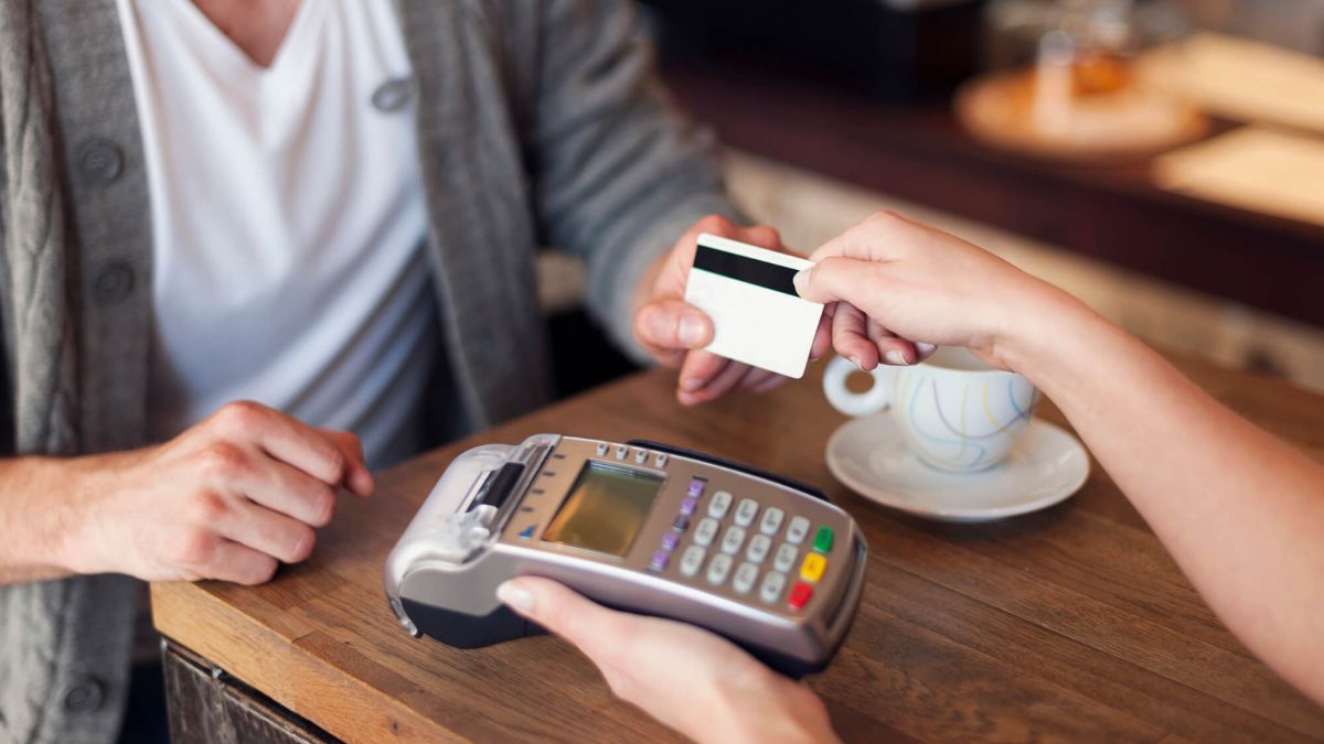 Customer Paying For Coffee With Credit Card MSN