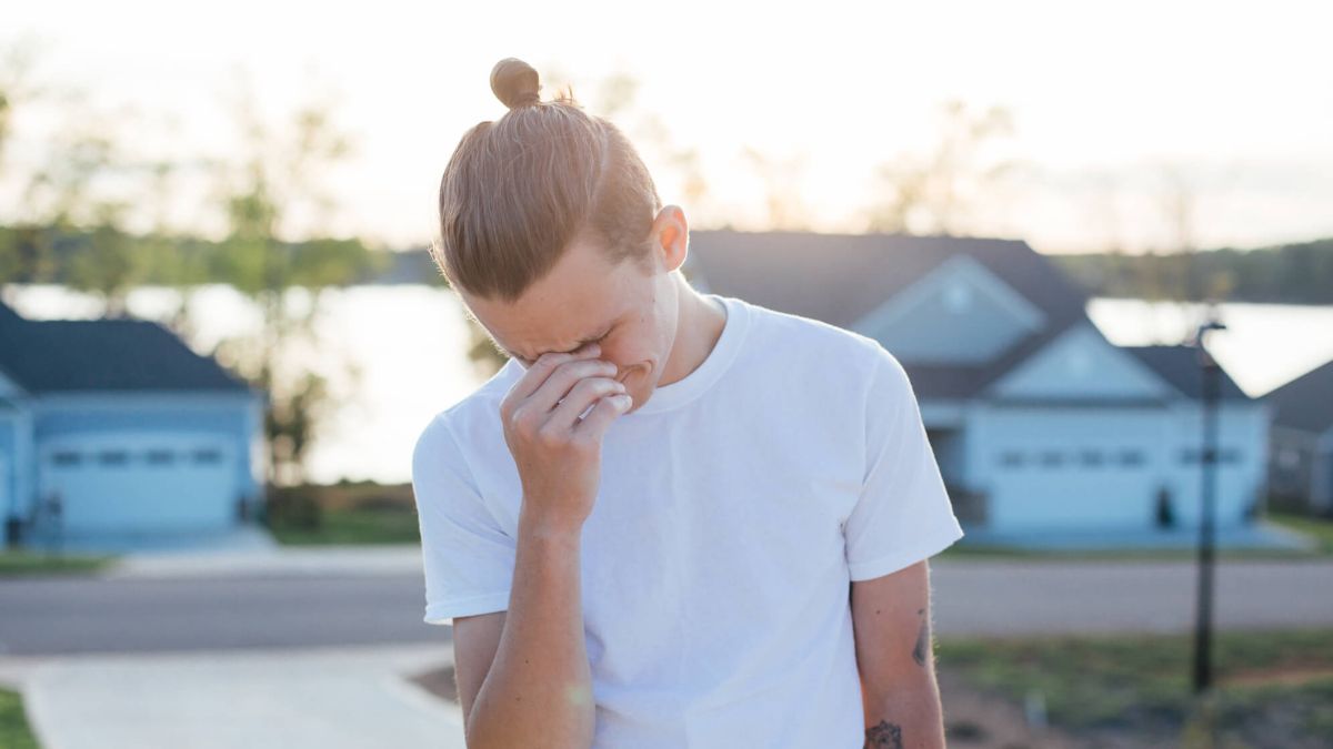 Guy Crying On Street With Head Down MSN