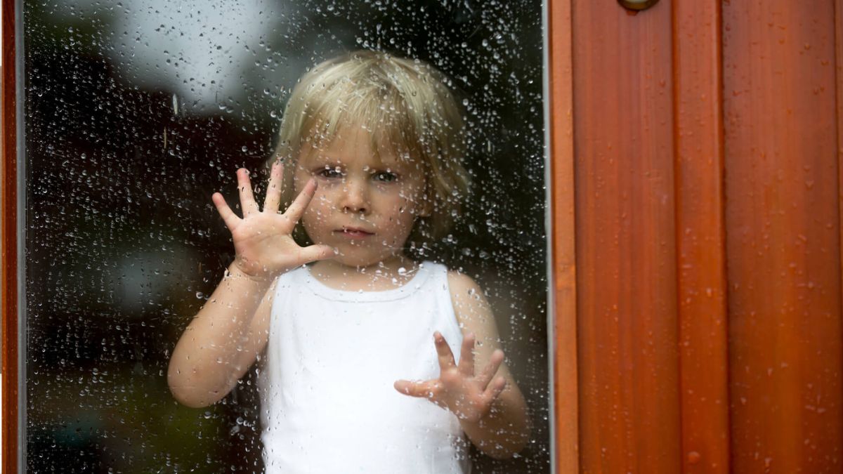Sad Child Behind Window On Rainy Day MSN