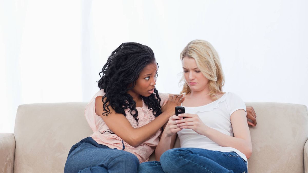 Sad Woman Sitting On Couch While Friend Comforts Her MSN Sad Depressed Anxious