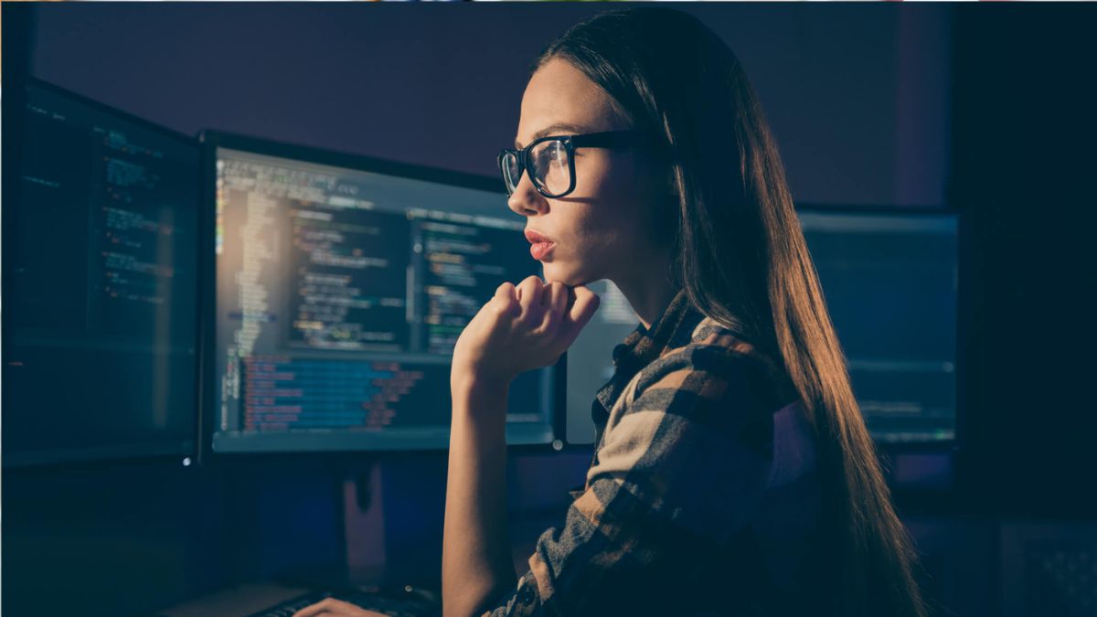 Side Profile Of Woman Coding On Computer MSN