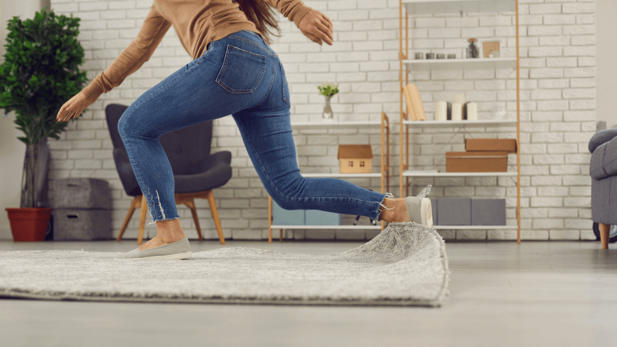 Woman Falling Tripping Over the Rug in Living Room MSN