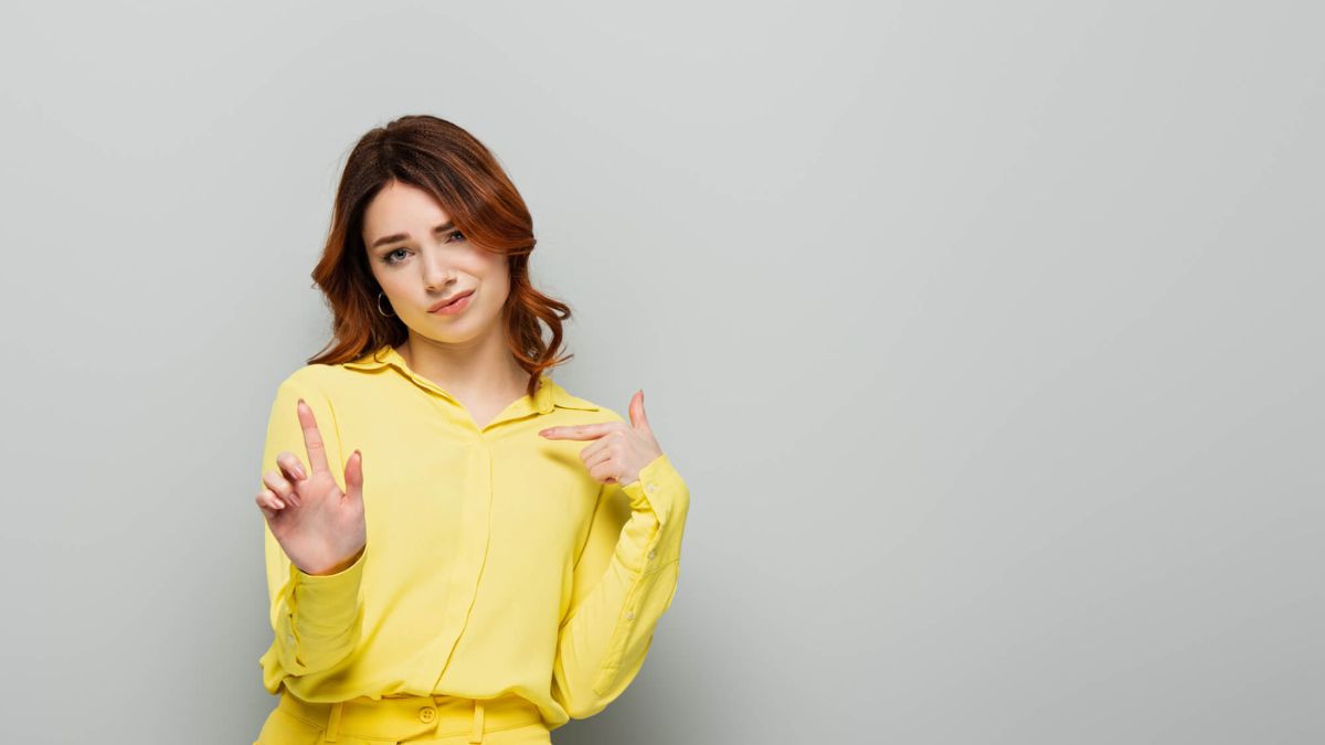 Woman Pointing At Herself Smug Look MSN