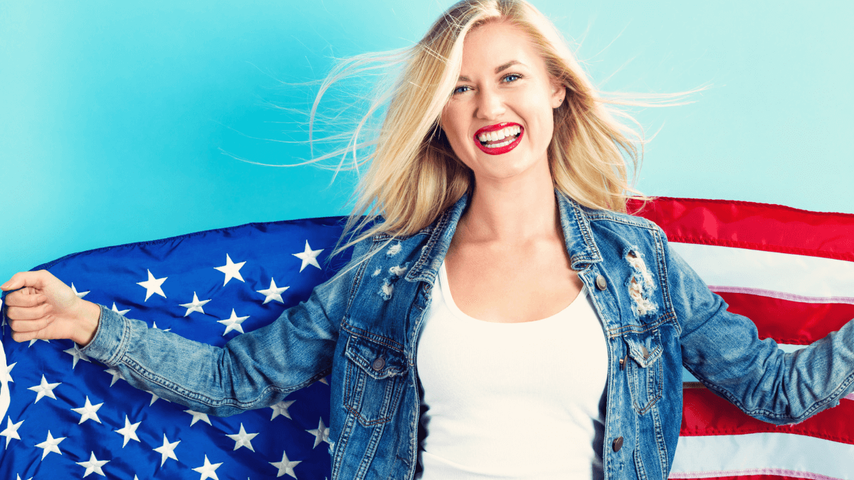 Woman Smiling Happy Holding American Flag MSN