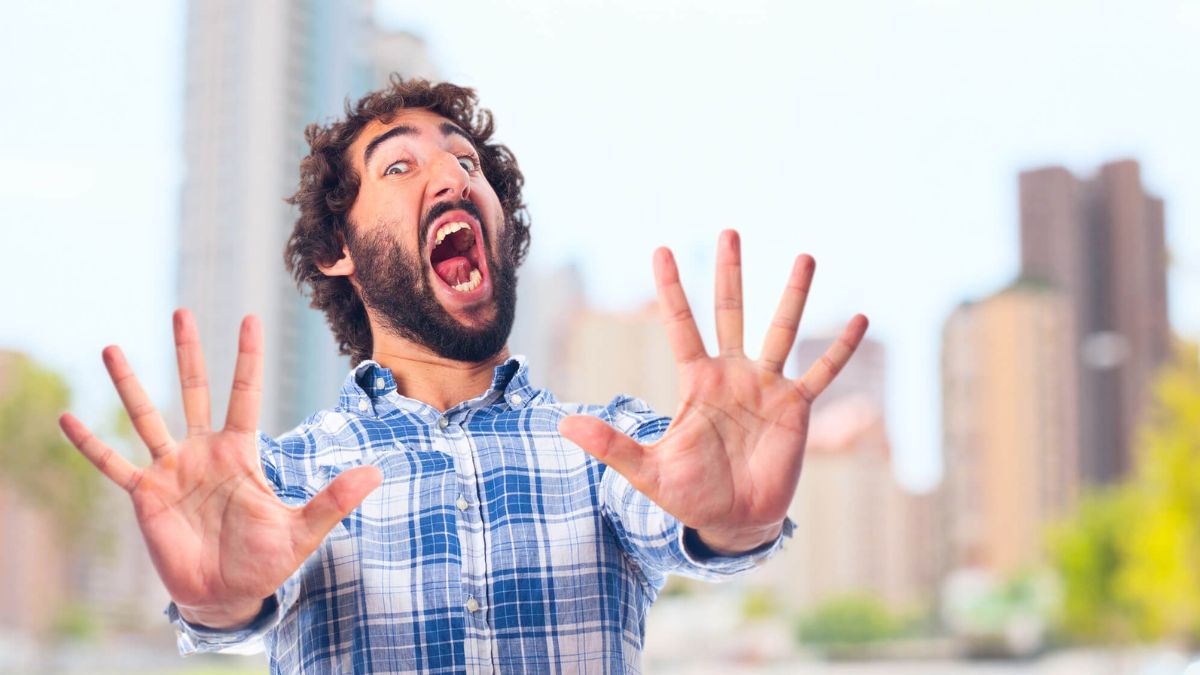 Young Shocked Frightened Man With Hands Outstretched MSN