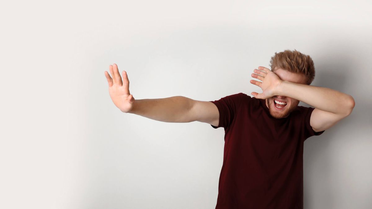 Young Man Being Blinded And Covering Eyes MSN Shocked Surprised