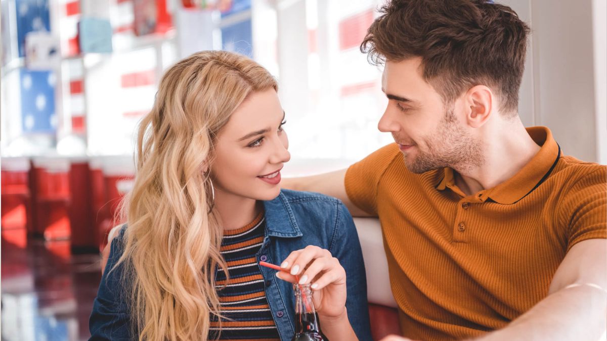 Couple Smiling And Talking While Looking At Each Other MSN