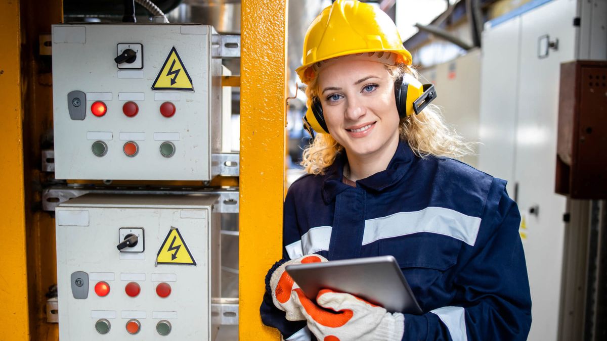 Engineer In Safety Equipment Standing In Power Plant MSN