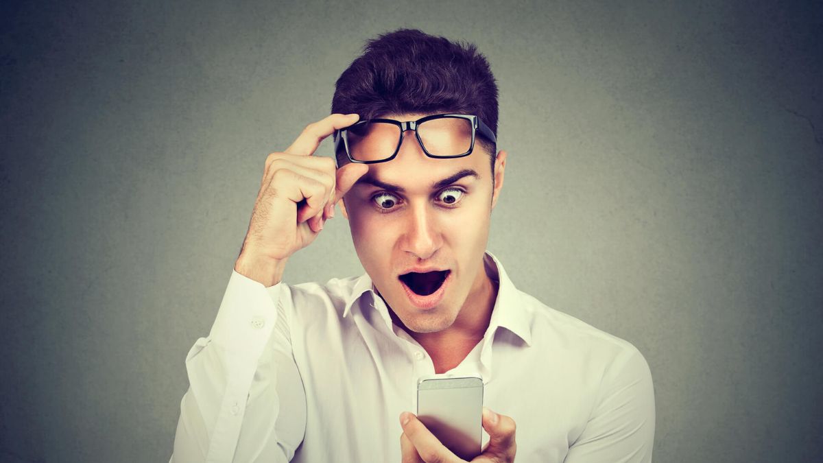 Man Looking At Phone Shocked Face MSN