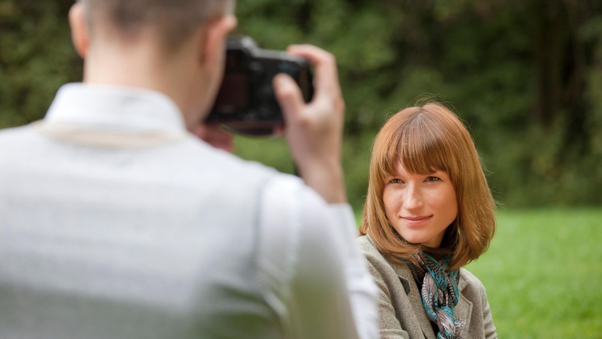 Man Taking Photo Of Woman Outdoors MSN