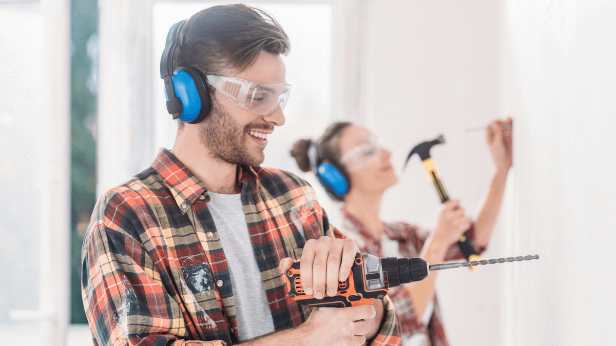 Man Using Powertools Drill Fixing Up the House MSN