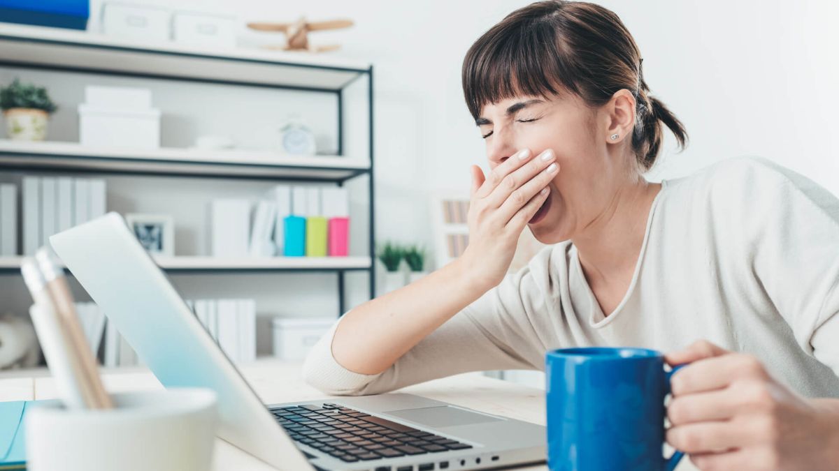 Sleepy Tired Woman Working At Office Desk MSN