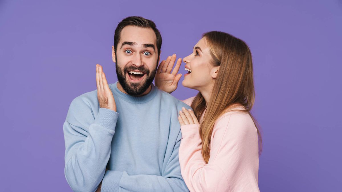 Surprised Young Couple Talking With Each Other MSN