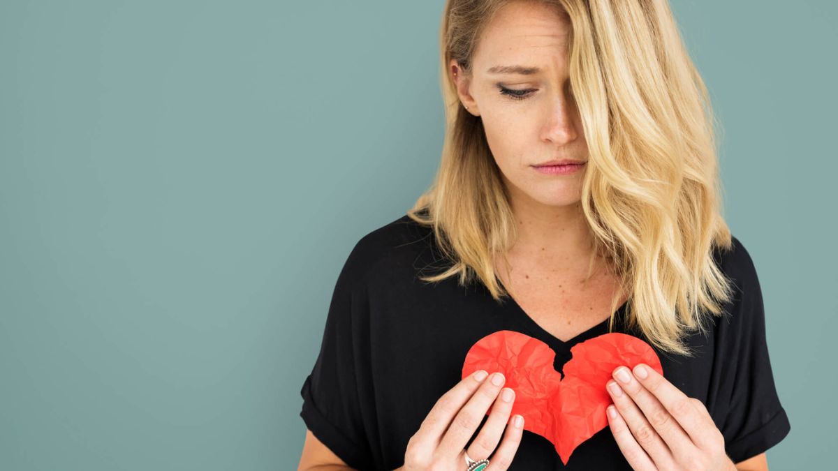 Woman Holding Broken Heart MSN
