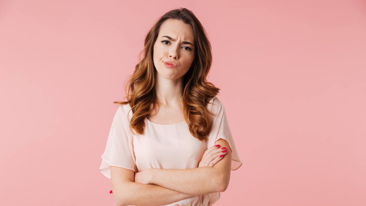 Young Woman With Arms Crossed Looking Upset MSN