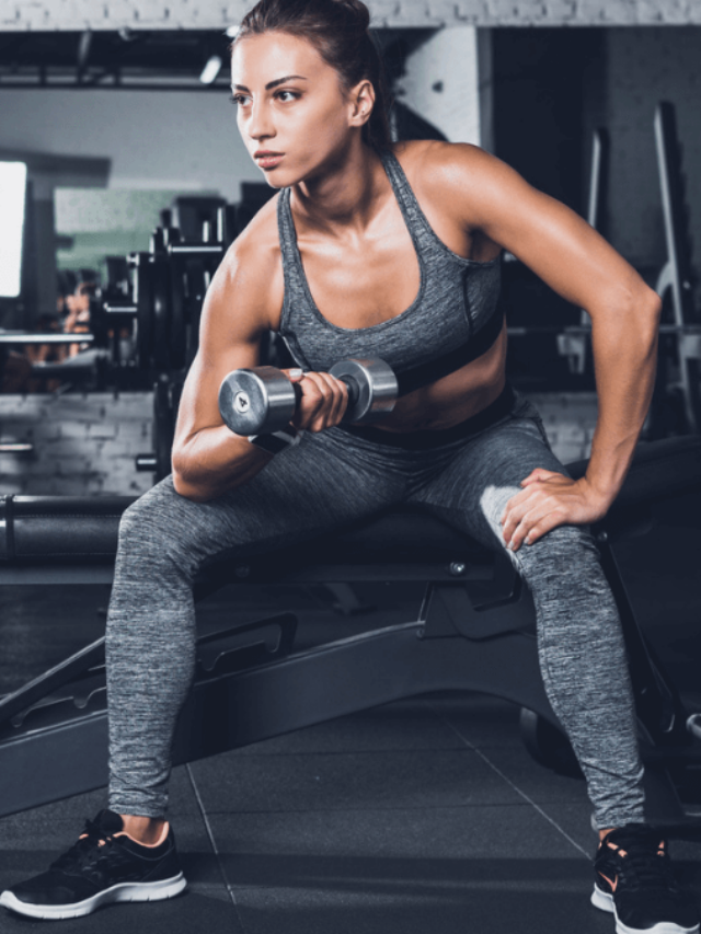 Woman Working Out In Gym Doing Sport and Lifting Weights MSN
