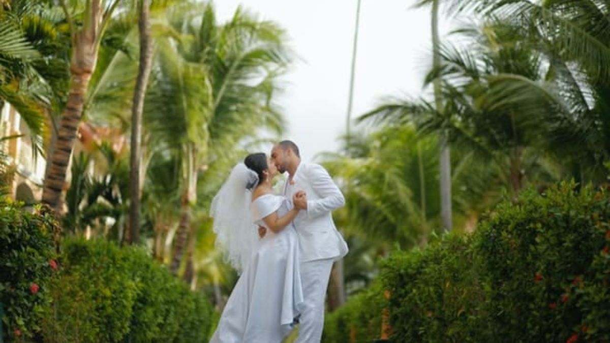 Couple On Wedding Day Wearing White MSN