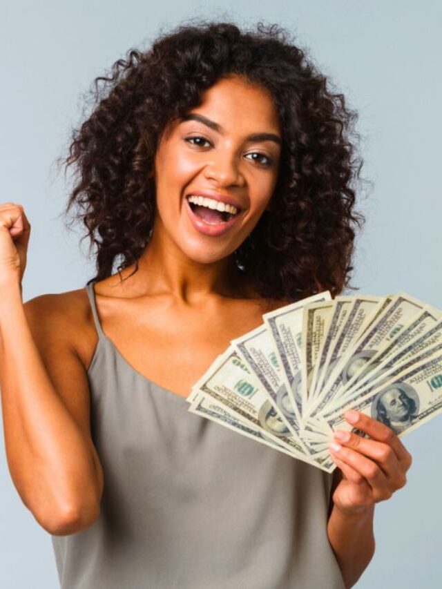 Smiling Woman Holding Money MSN