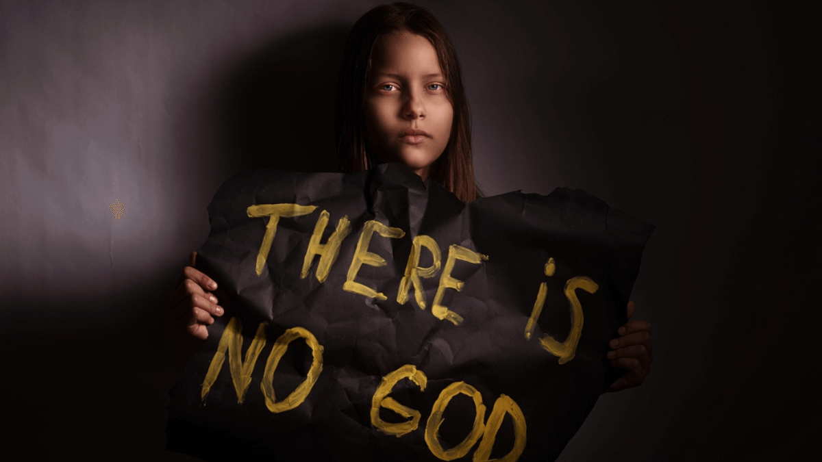 Atheist girl holding a banner MSN