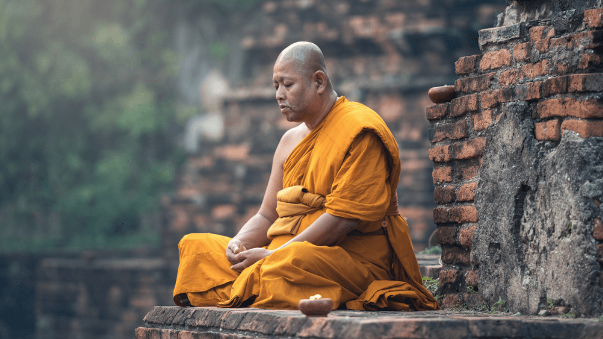 Buddhist monk meditating in the temple MSN