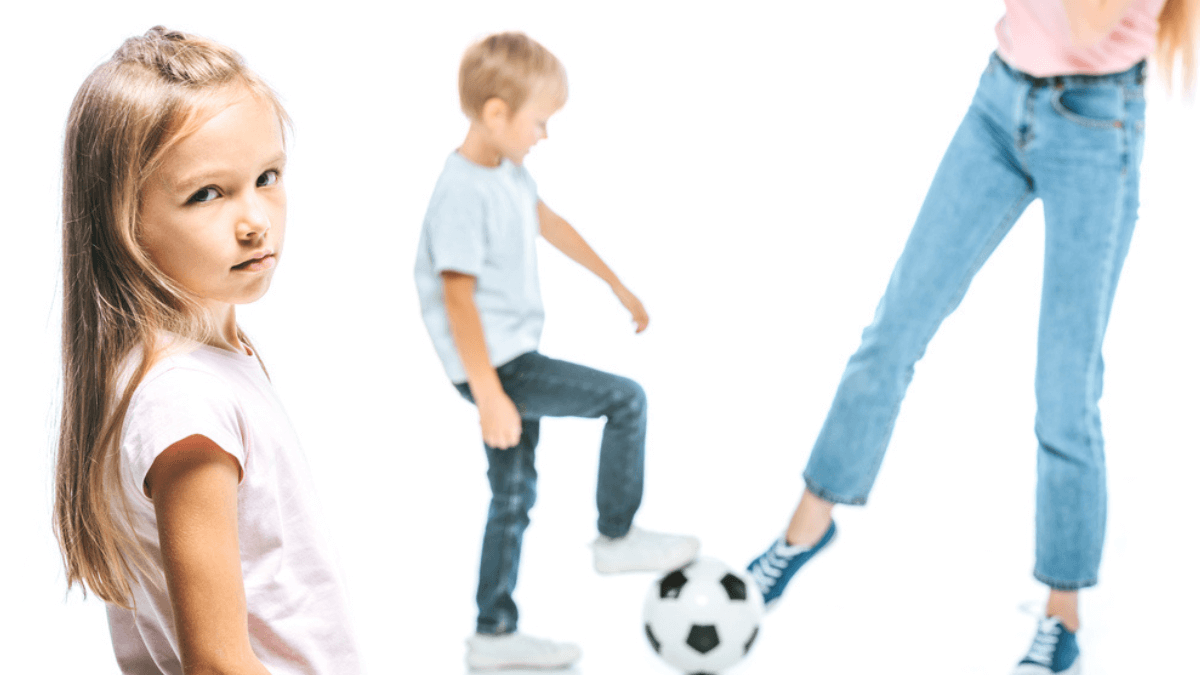 Sad girl with brother and mom playing soccer MSN