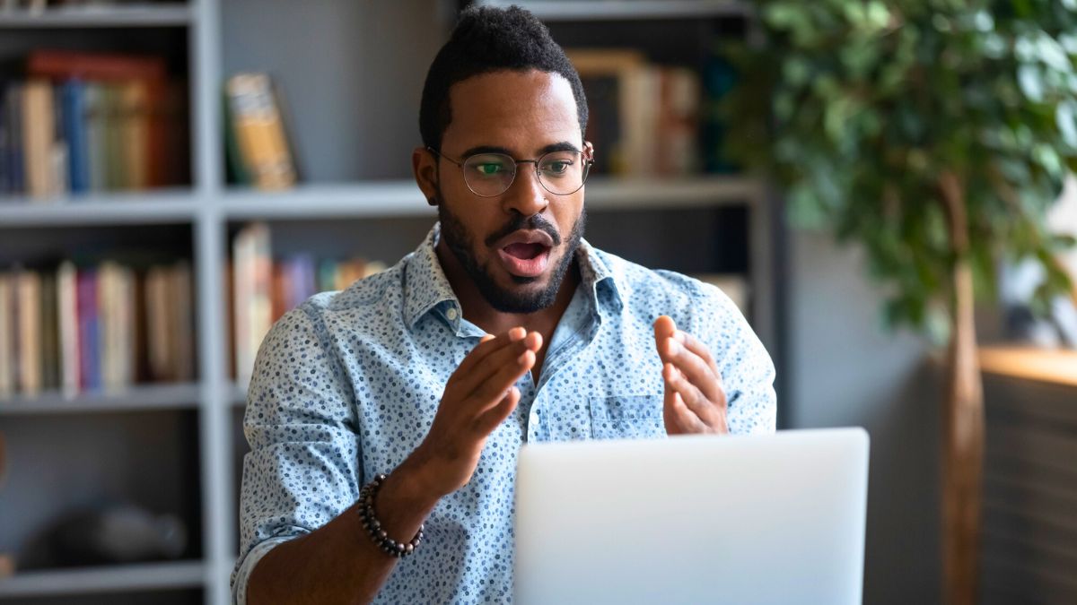 Shocked Man Looking at His Laptop MSN