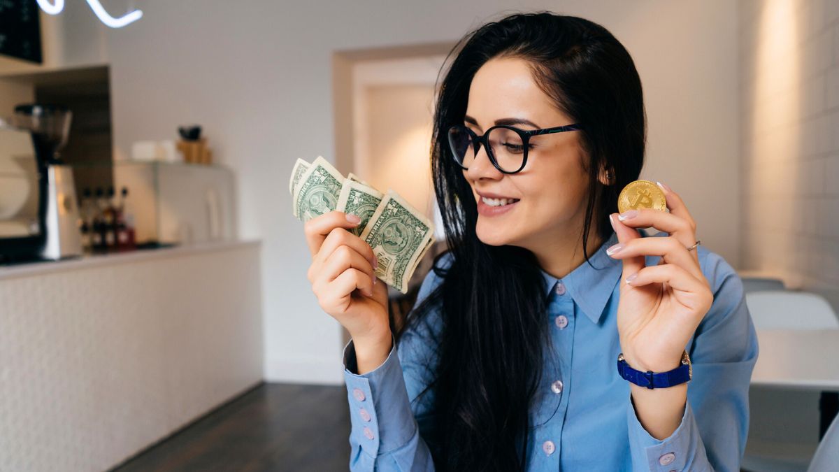 Woman in Blue Holding Bills and Coin MSN