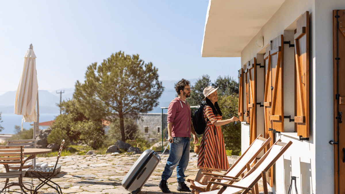 Couple Checking into Their Holiday Home Airbnb MSN