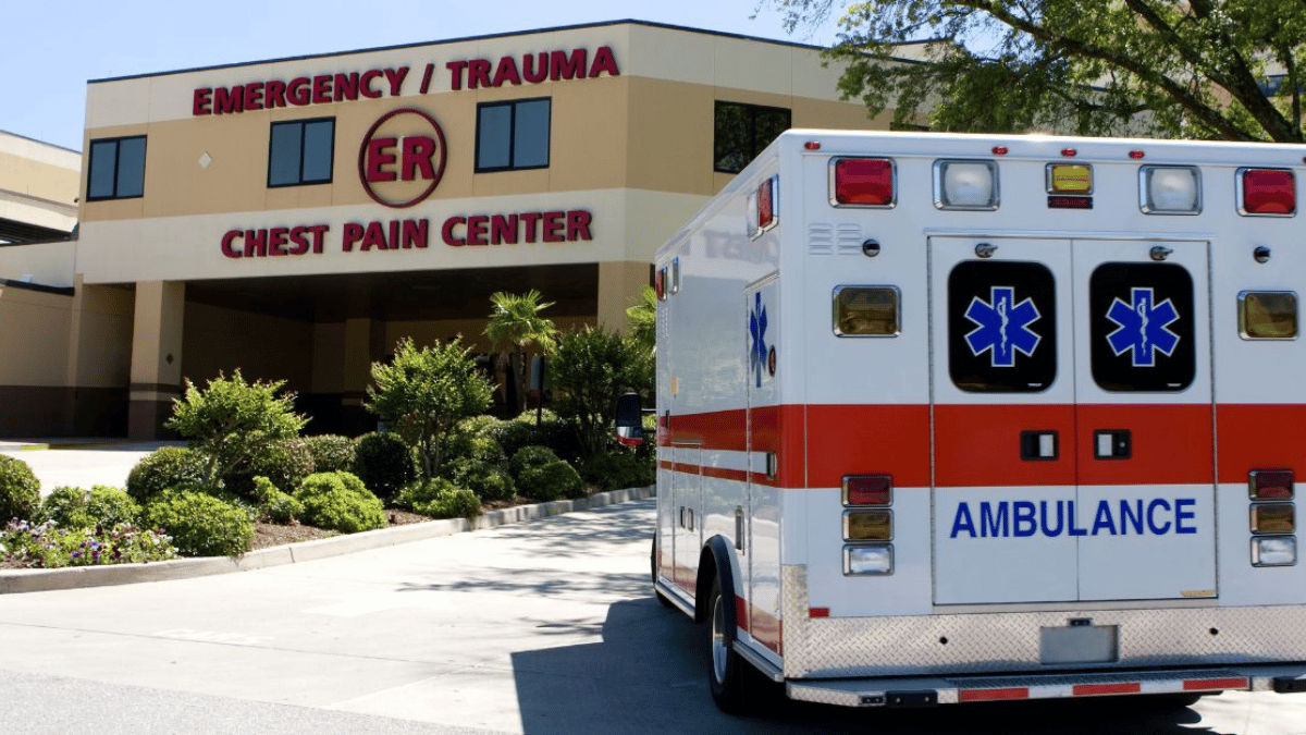 Medical Emergency with Ambulance in front of hospital clinic emergency center
