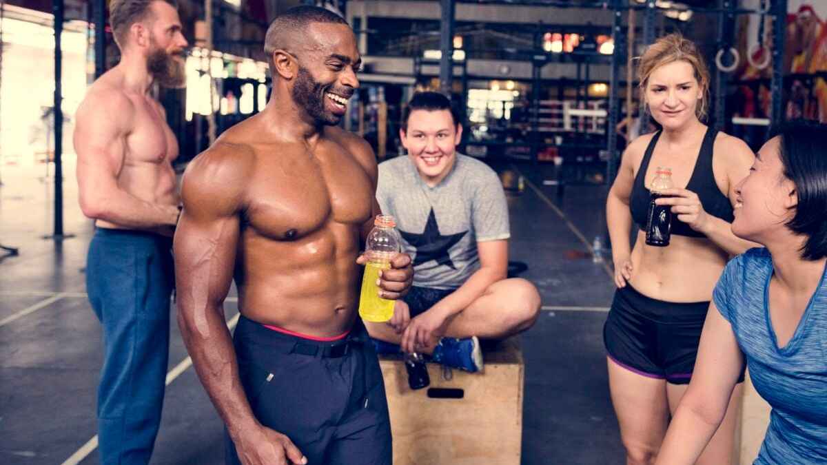 A diverse group of people working out in a gym MSN.
