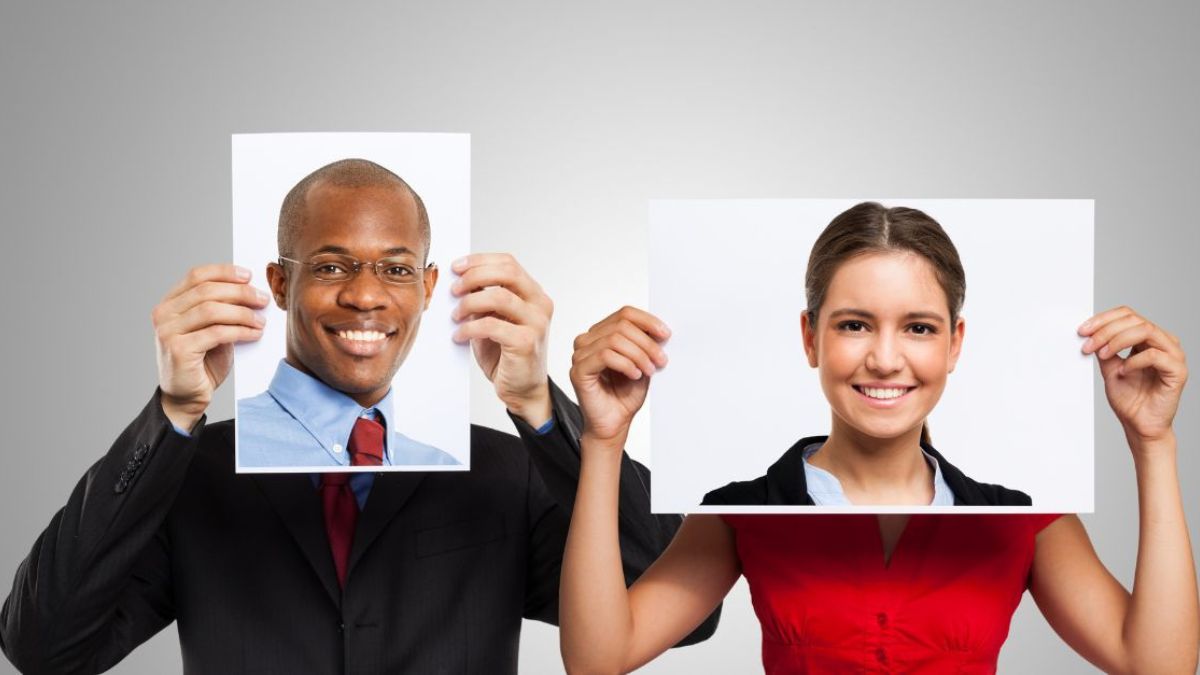 Identity theft MSN man and woman holding screen for face