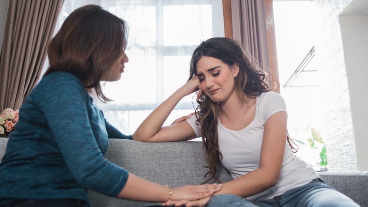 Woman comforting her crying friend MSN