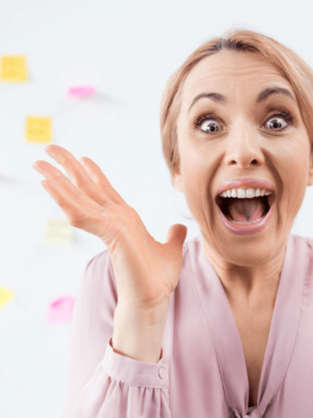 Excited blonde businesswoman