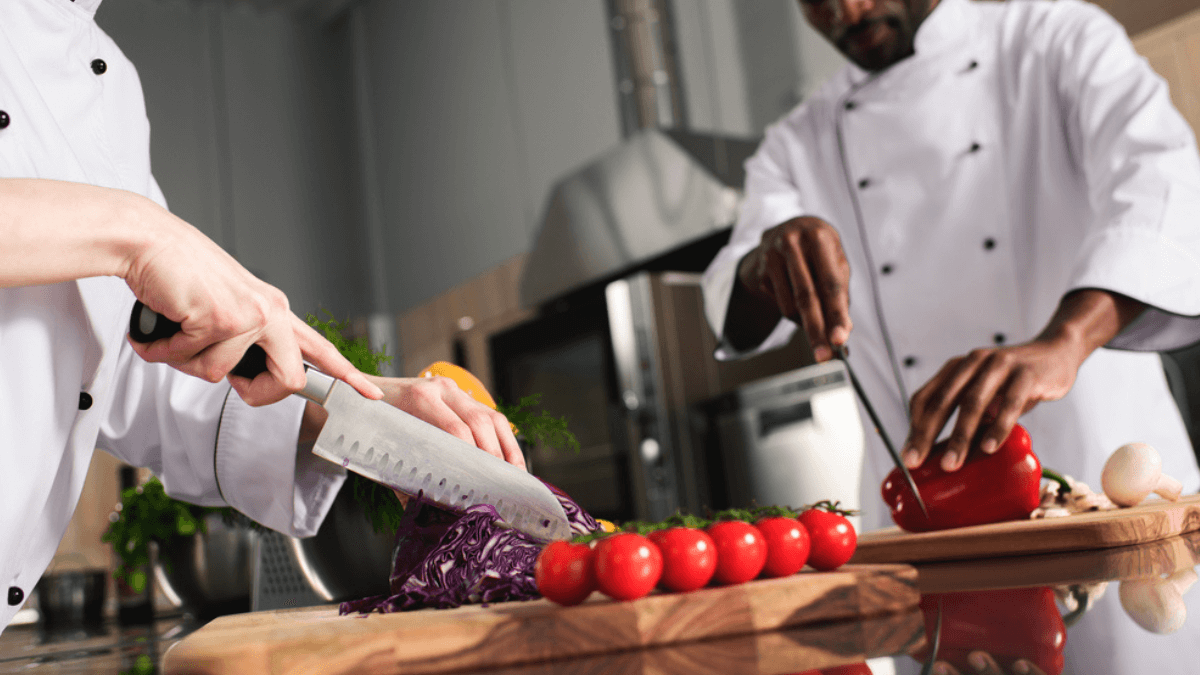 Chefs cutting vegetables with knives MSN