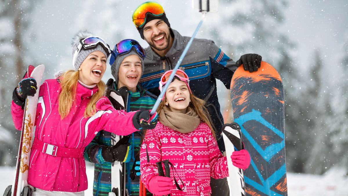 A beautiful, loving family, taking a selfie at a ski resort MSN skiing snowboarding wintersport