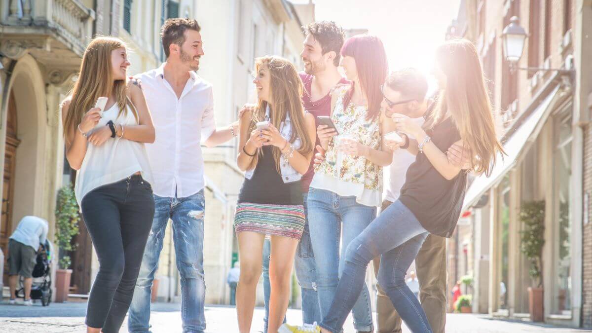 Smiling Group Of Friends Meeting In City Center MSN