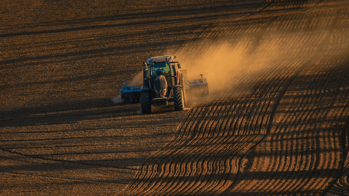 Tractor working on agriculture field
