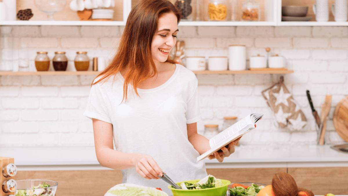 Woman reading in the kitchen MSN