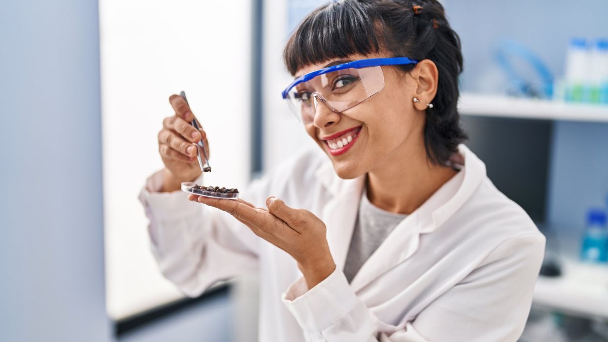Smiling scientist doing experiment MSN