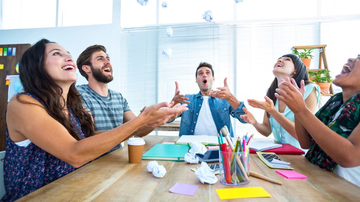 Creative Business People Throwing Paper in the Air MSN
