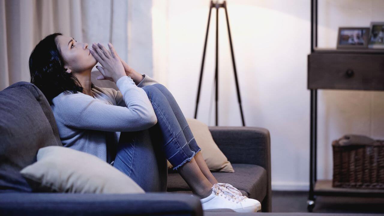 Woman on the Couch Praying MSN