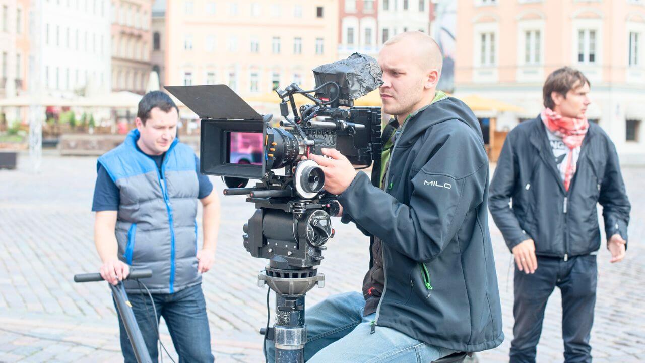 Cameramen With Their Equipment at Shooting