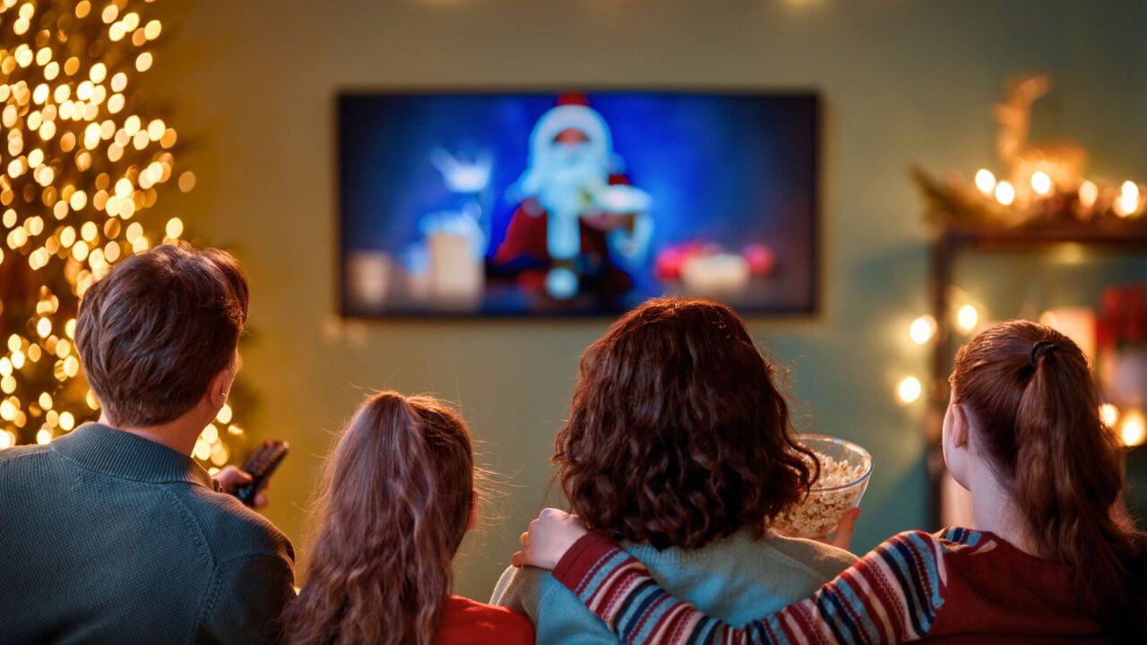 Family Watching Holiday Movies at Home