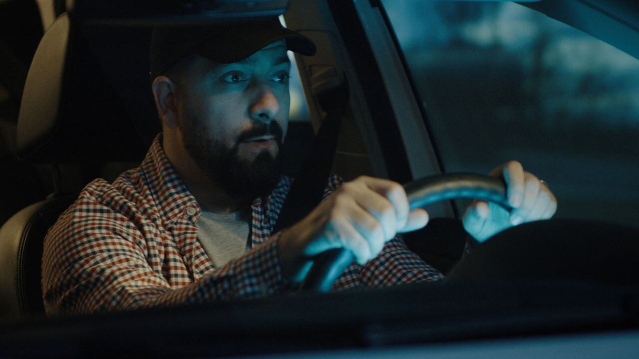 Sleepy Man Driving At Night